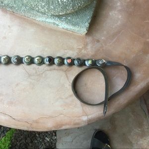 45” Leather with 12 1 1/2” medallions and a 2” sun belt buckle.